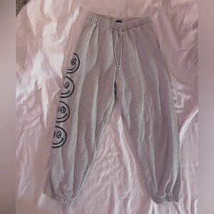 PAC sun smiley face sweats